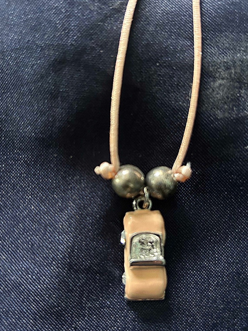 NECKLACE GLASS PEACH & SILVER TONE PENDANT WITH SILVER TONE BEADS & PEACH CORD,
